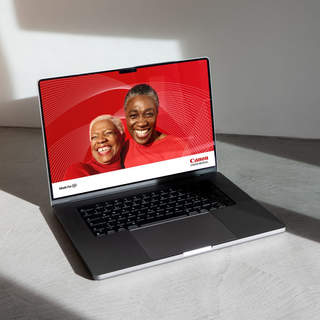 laptop displaying Canon Medical brand