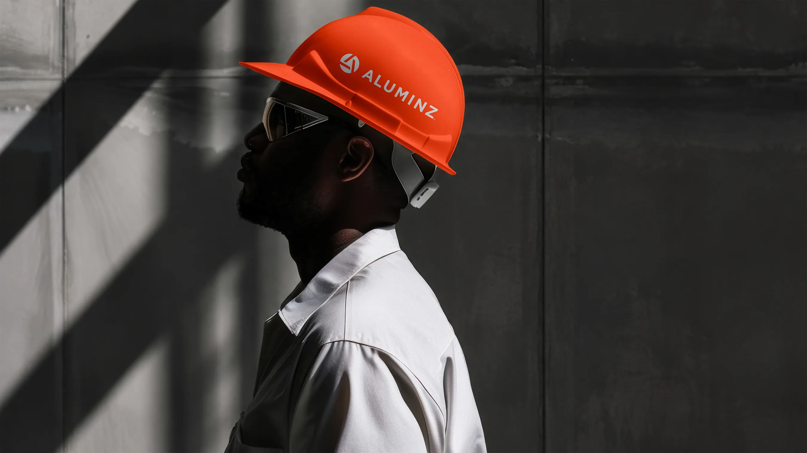 person wearing an Aluminz branded hardhat